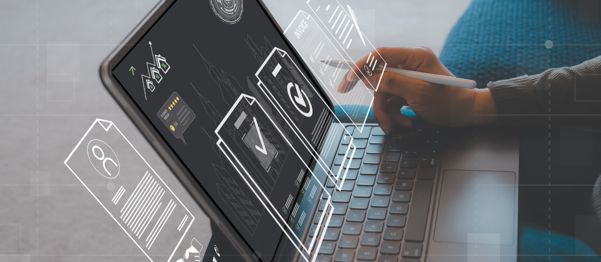 Laptop on a desk with a hand holding a stylus on the screen. Hovering above the screen are five digital holograms depicting note-taking, checklists, and reports.